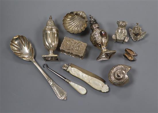 Ten assorted small silver items including a Victorian pocket fruit knife, two condiments etc. and a button hook.